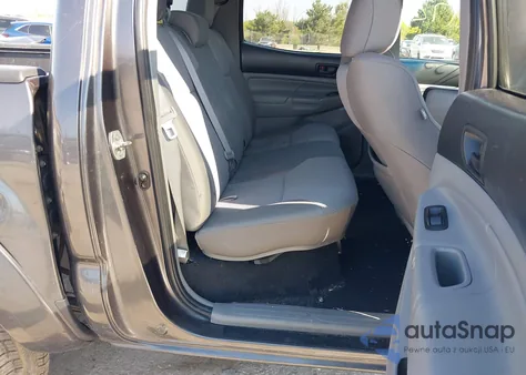 2013 Toyota Tacoma Base V6 z USA, uszkodzony, nr VIN 3TMLU4EN2DM129101